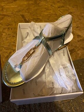 GUESS Metallic Green T-Strap Sandals with Gold Chain Accent